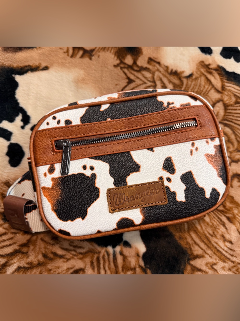 Wilson Cow-Print Sling Bag in Brown and White